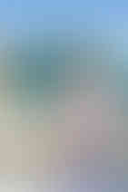 little girl sitting in a vintage truck decorated for Easter 