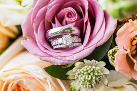 wedding rings on flowers
