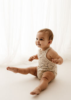Close up of baby with a cake during cake smash - best photography studio in Essex - bishops Stortford Hertford, Harlow and chelmsford 