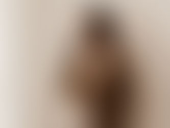 pregnant mum neutral maternity session chunky brown cardigan pregnant belly on show