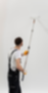 man painting a wall