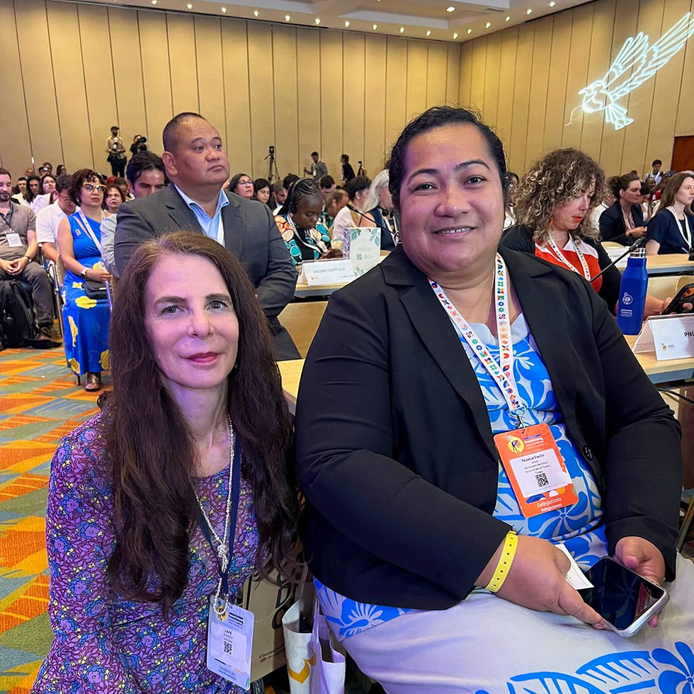 Osprey Orielle Lake, WECAN Executive Director, meets with Pepetua Latasi, Director of the Department of Climate Change and Disaster for the Office of the Prime Minister of Tuvalu, during the High-Level Segment of the First Conference on Transitioning Away from Fossil Fuels. Photo Credit: WECAN