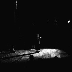 person standing on stage_edited.jpg