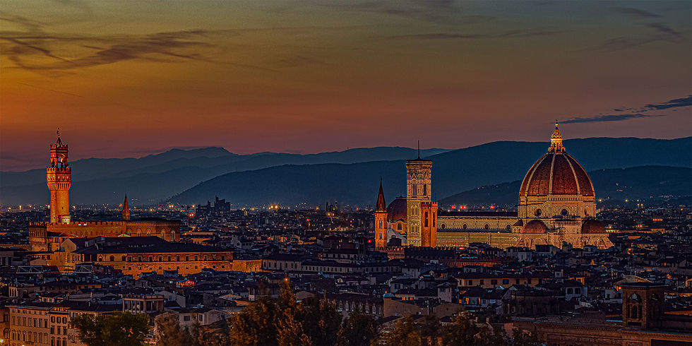 Florence skyline at sunset with the Duomo and Palazzo Vecchio against the Tuscan hills