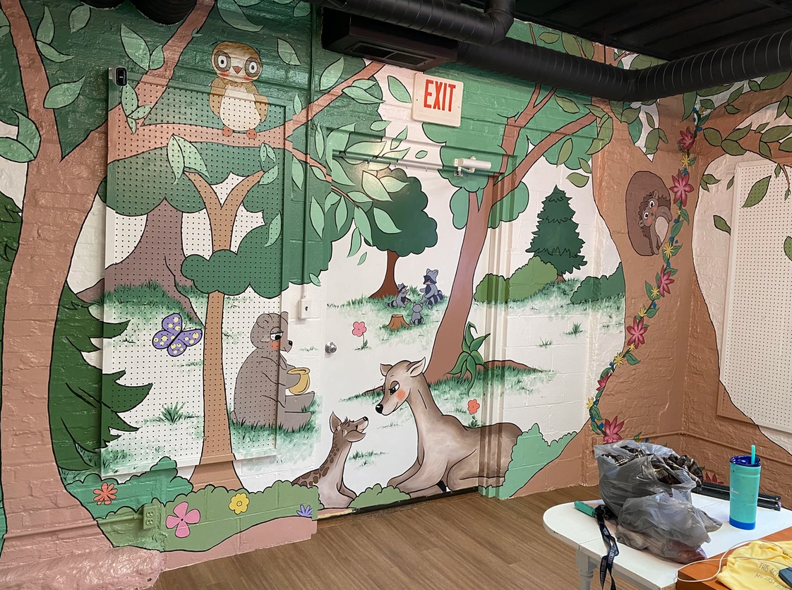 Mural of animals in a forest