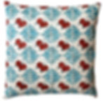Square cushion with a diamond shaped pattern of abstracted rosehips in red and leaves in teal