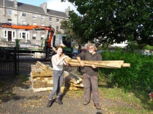 Taking planks to Leith Community Croft for a children's play village.