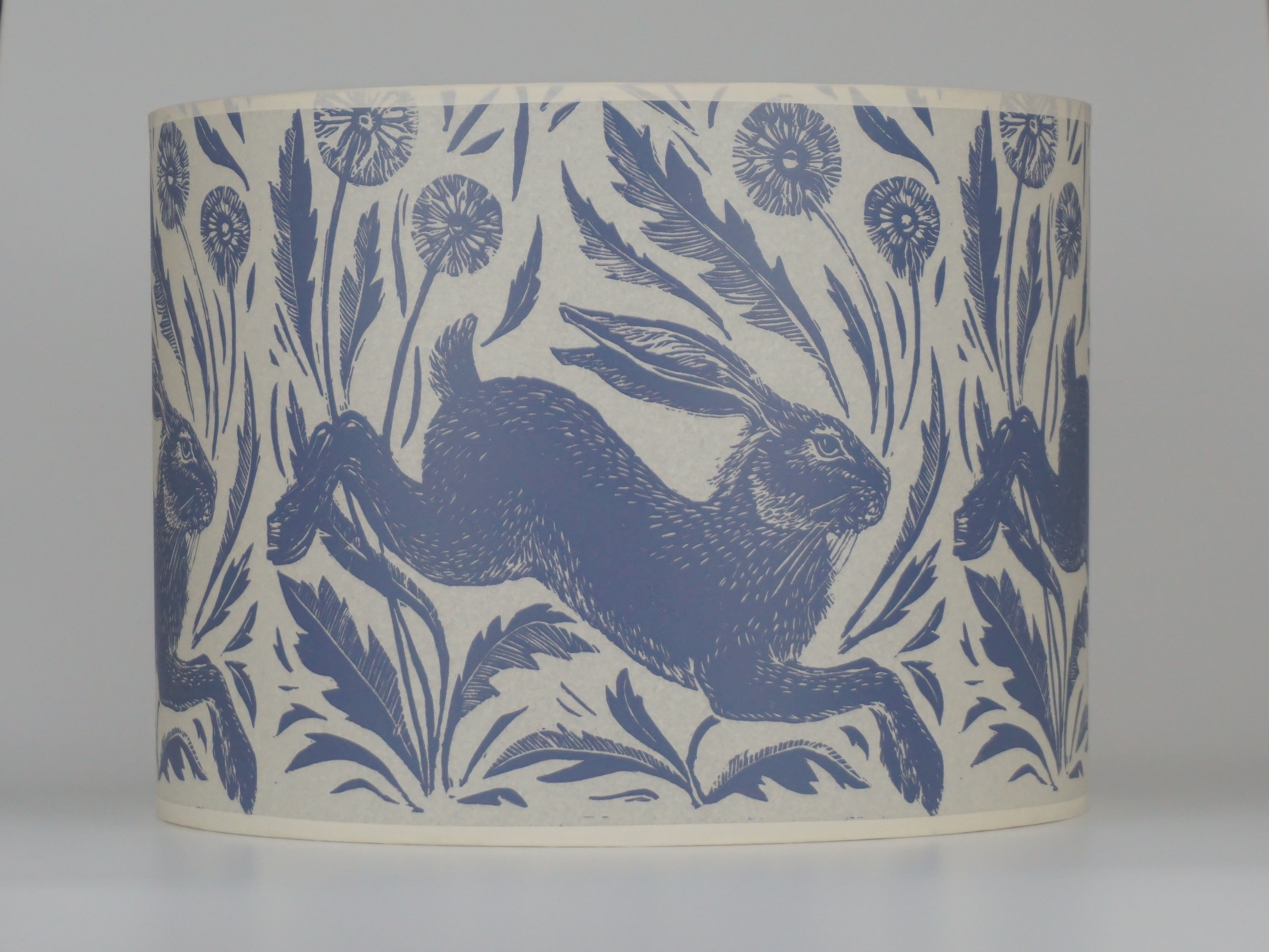 Hare and dandelions lampshade, grey. From £66