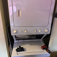 Stacked washer and dryer repair