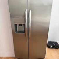 Side-by-side refrigerator with water and ice dispenser repair