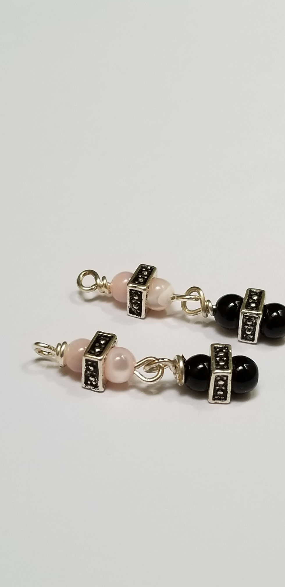 Thumbnail: Semi-Precious Pink Cat's Eye and Black Onyx Mini Dangle Earrings Elemental