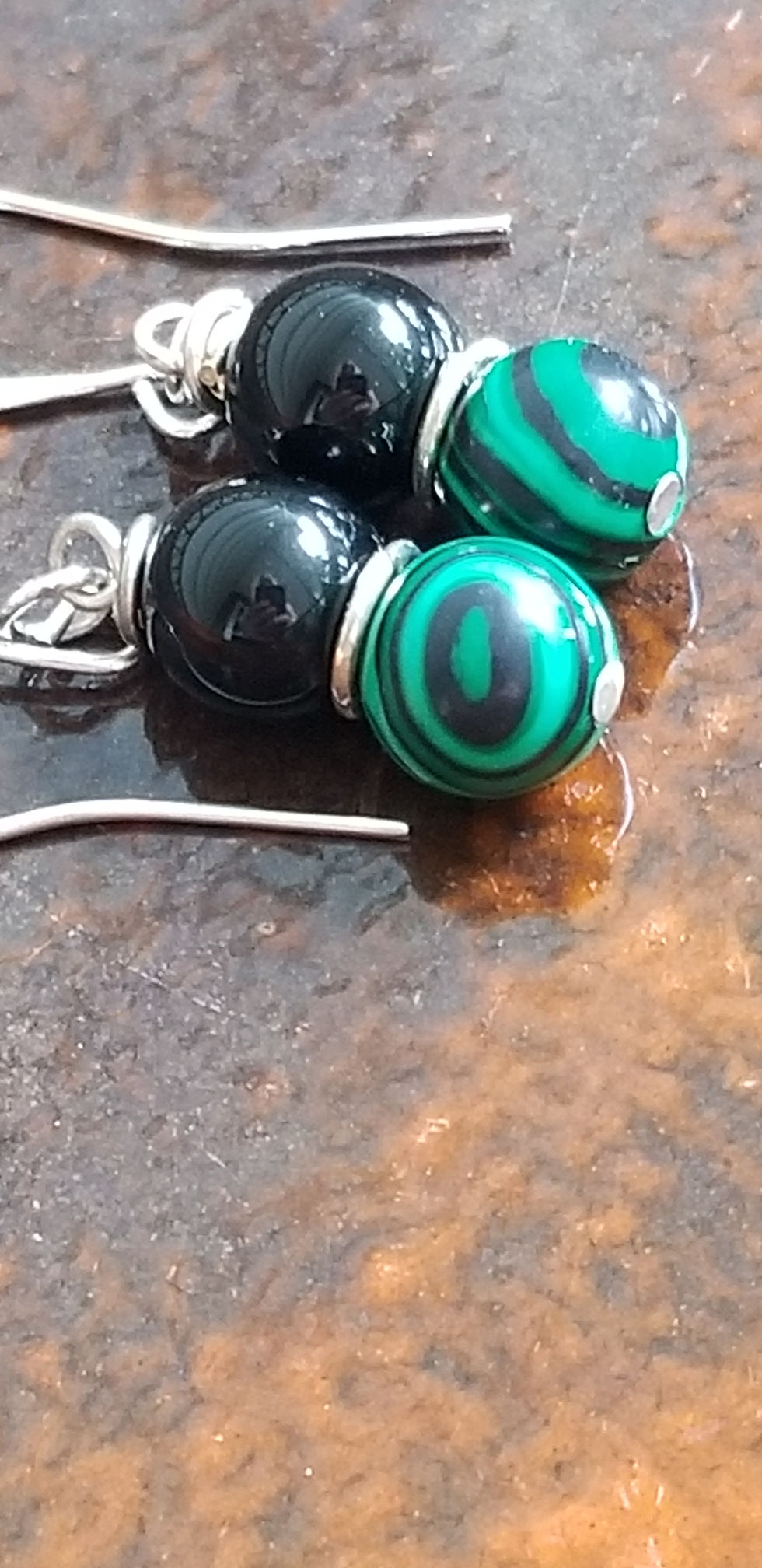 Thumbnail: 2 beads on sterling silver made out of malachite and jet