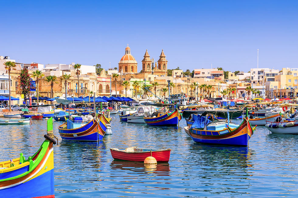 Malta, Marsaxlokk Traditional fishing boats in the Mediterranean Village.jpg