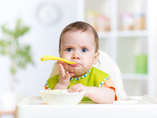 When is the best time to introduce solid foods to my baby?
