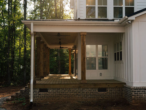 Front porch and upper exterior of the Honeysuckle custom new construction home