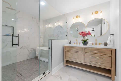 Luxury bathroom renovation with walk in shower, freestanding tub, and double vanity