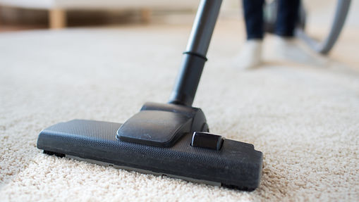 Professional residential Cleaner Cleaning The Carpet