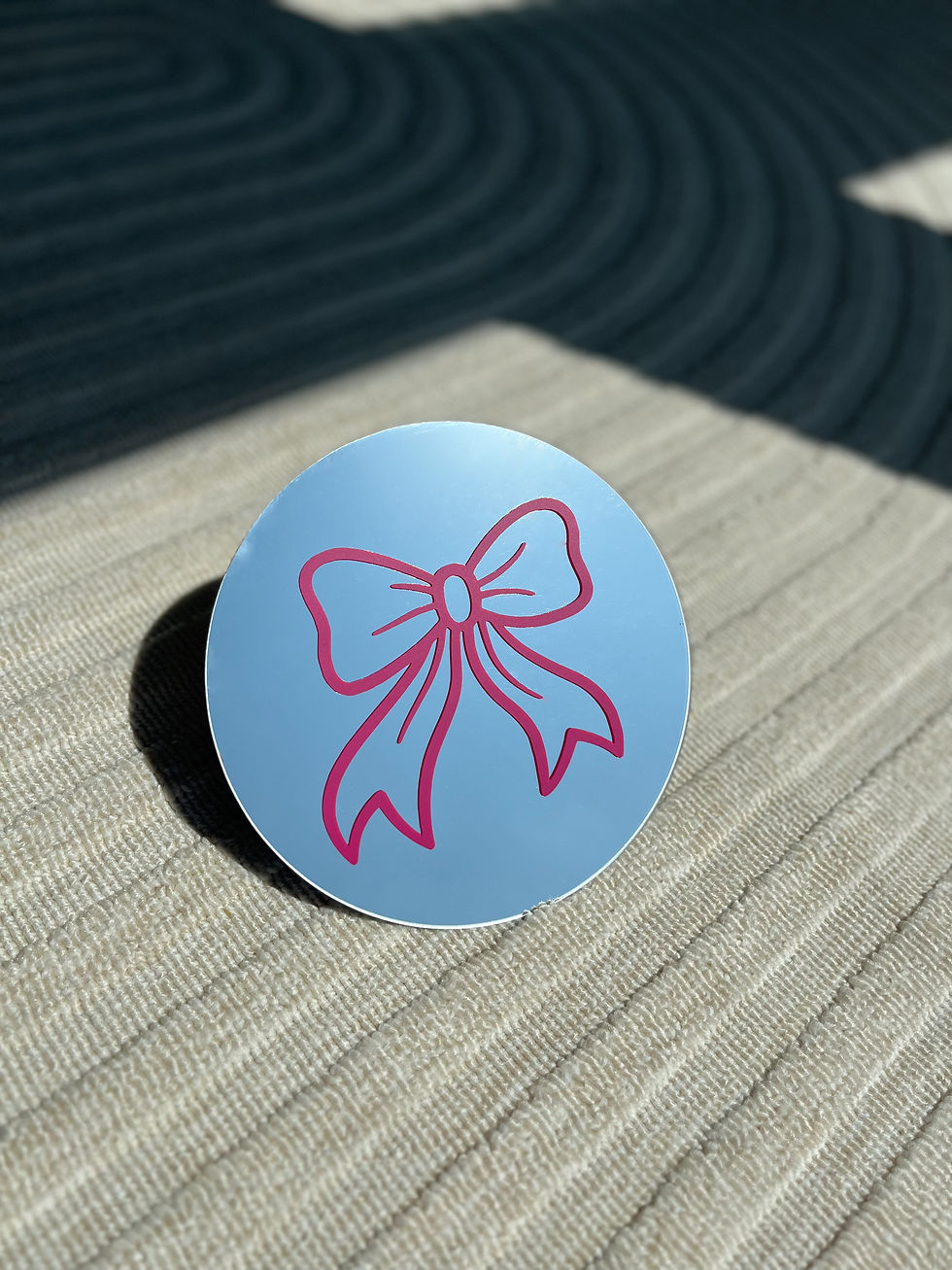 Kids colorful, round mirror with a bow