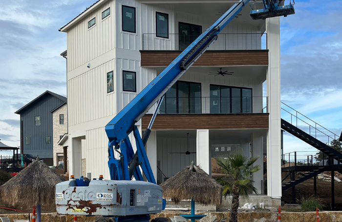 Seamless gutters installed on a commercial brick building in Round Rock, TX.