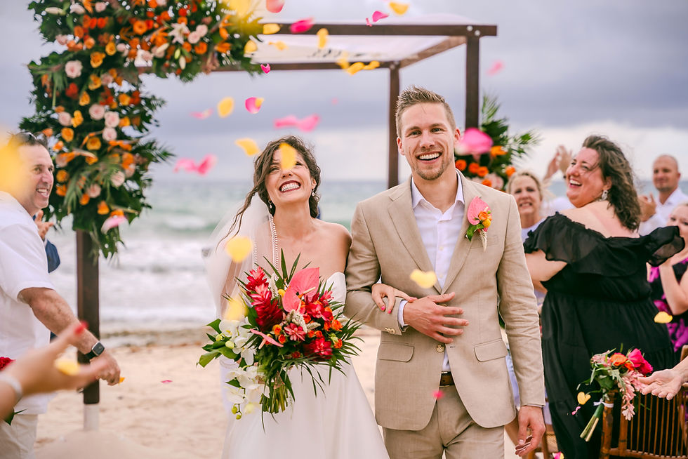 Bride and groom celebrate beach wedding planner Mexico by Magic Love. Destination wedding. Valentin Imperial Riviera Maya 