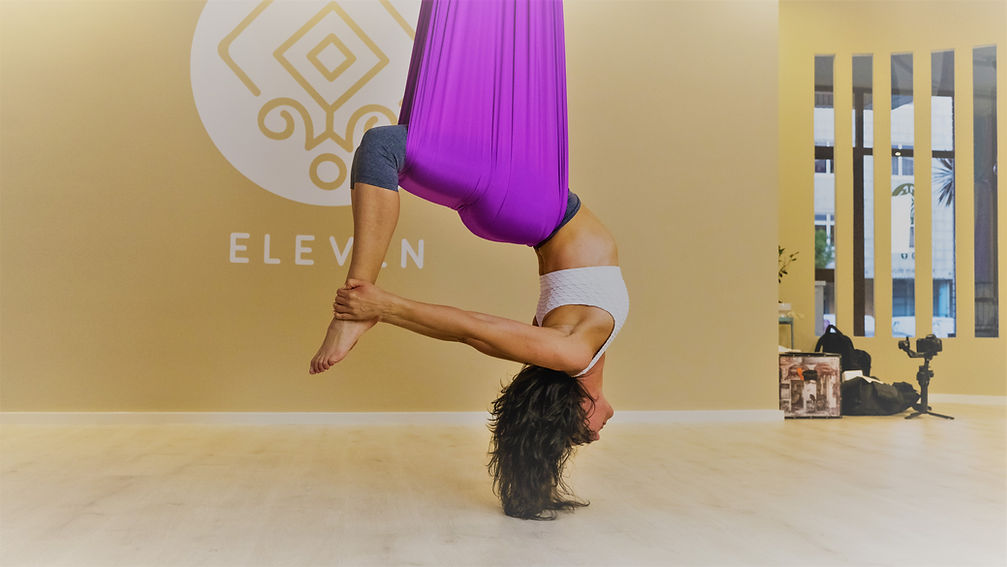 Postura em tecido de Yoga Aéreo