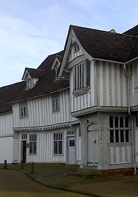 Hardwood shutters fitted in a Lavenham timber-framed cottage