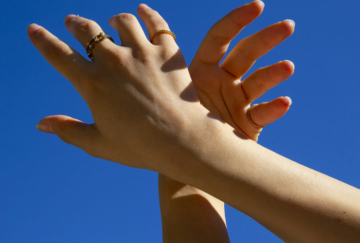 Friendly handshake between a therapist and a client in a bright office context