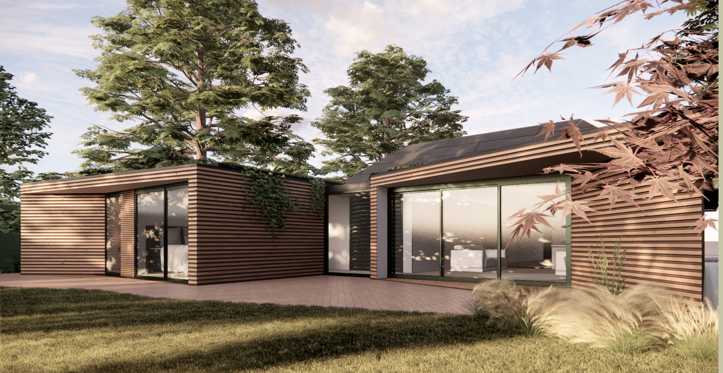 evening view of a bungalow extension with larch timber cladding, extension and renovation greyshott hampshire