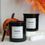 Thumbnail: Two black Fireside candles with fall decor and Mocha Butter Co.