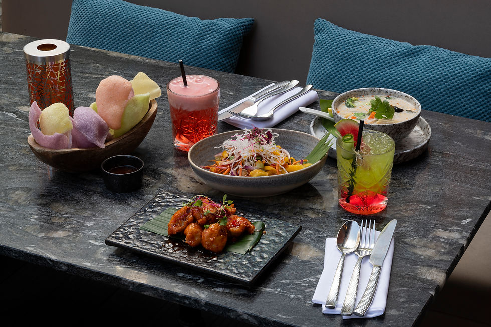 thai food on table with drinks