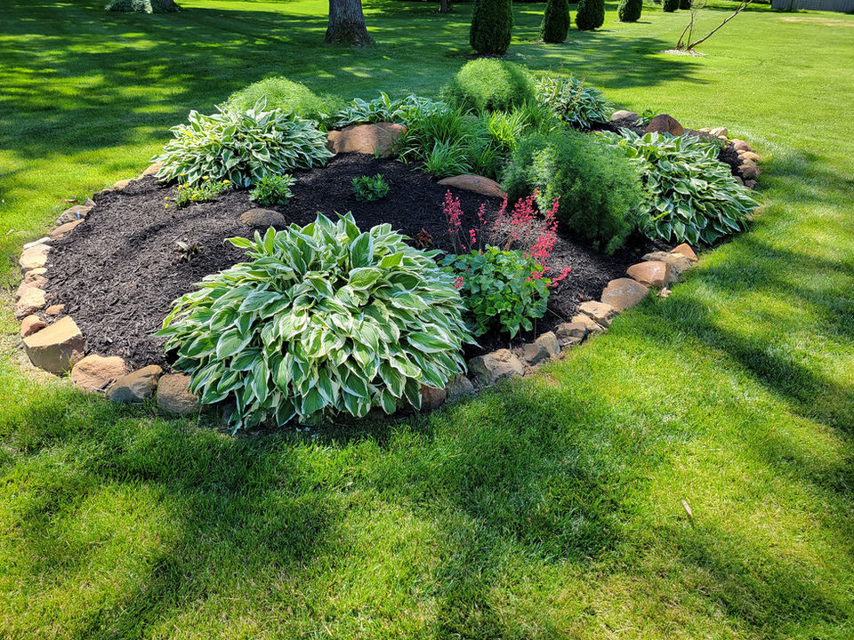 Landscape installation and ongoing garden bed maintenance services in Brookston and Reynolds, IN.