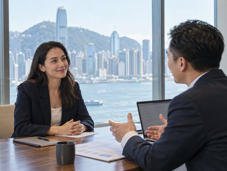 A spouse interviewing for a professional role with a Hong Kong company manager