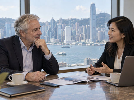 Senior international professional discussing relocation plans with an adviser in Hong Kong