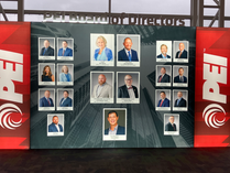 A modern display board featuring the current members of the Petroleum Equipment Institute Board of Directors, categorized by industry segments.