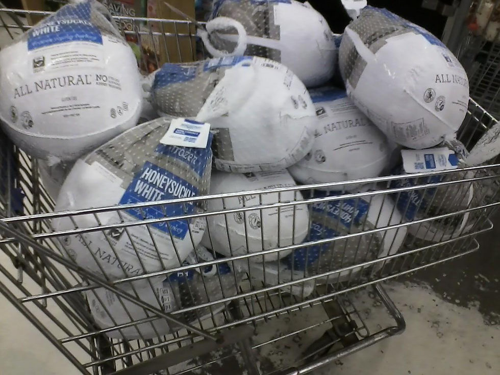 A grocery cart full of turkeys for Thanksgiving