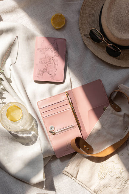 photoshoot travel aesthetic, sunlit picnic with magazine, passport, tote, lemon water