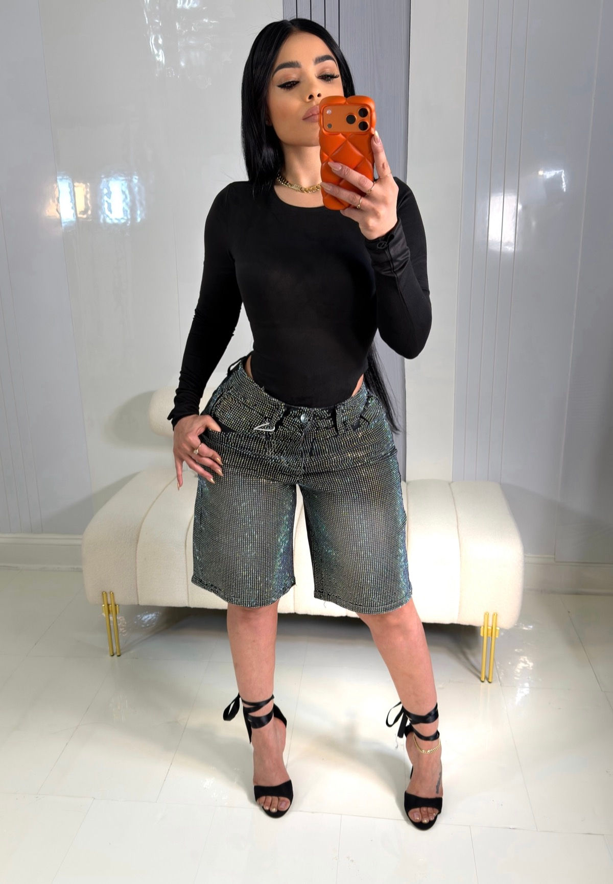 Albidalove shiny Bermuda shorts with zipper and buttons at the front.