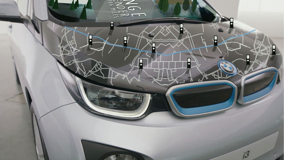A photo of the bonnet of a BMW i3, with overlaid graphics of a map and charging point locations.