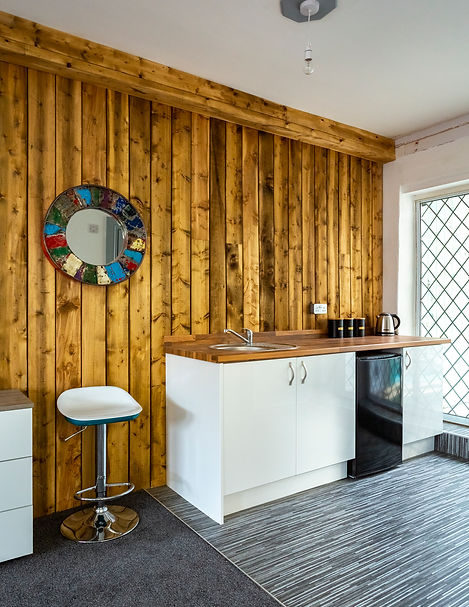 Kitchenette and wood cladding