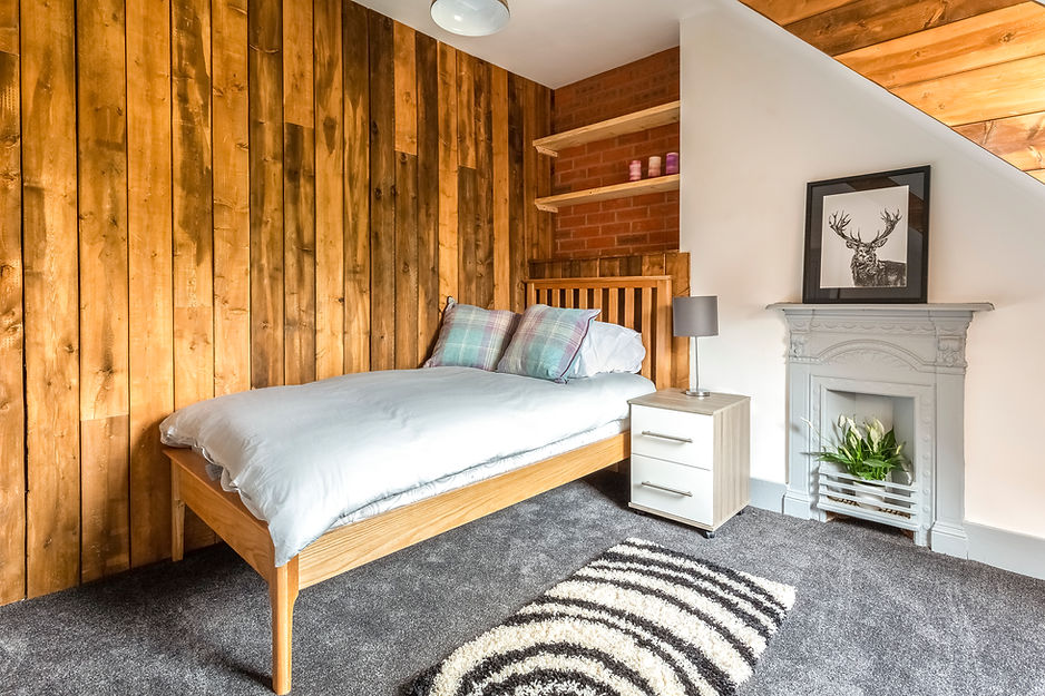 Wood cladding and brick feature