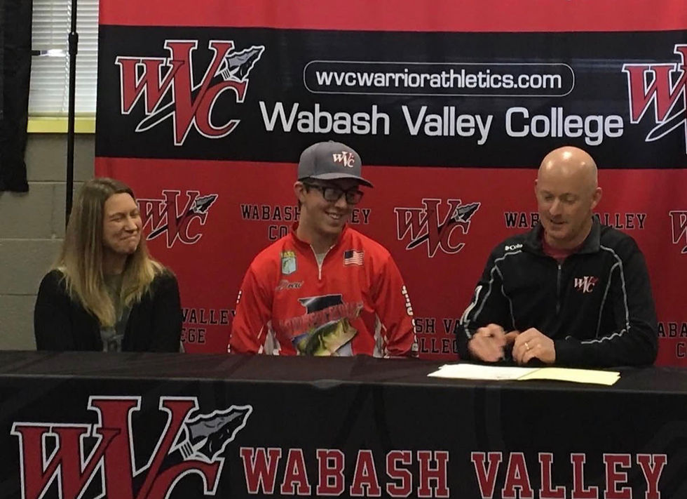 Credit: WVC Warrior Athletics Drew Gill signs his letter of intent to fish for his father Todd Gill, coach of the Wabash Valley College Bass Fishing team in 2020.