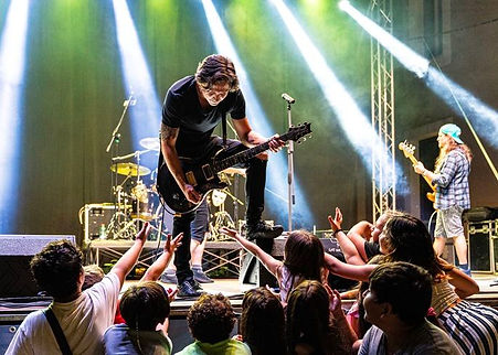 Frank from Third Place performing live in Italy, delivering a powerful stage presence during an international show