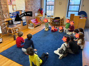 A preschool class watches a virtual author visit