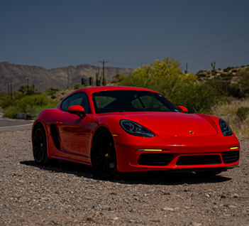 photo in texas of a red porsche cayman 718