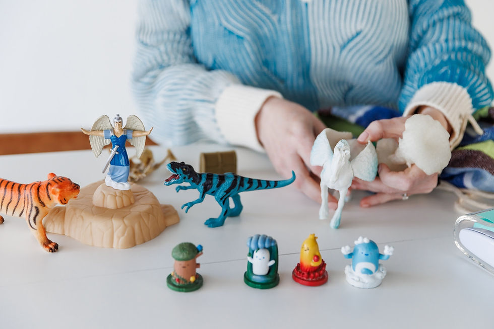 Caroline S Rains handling toys for therapy