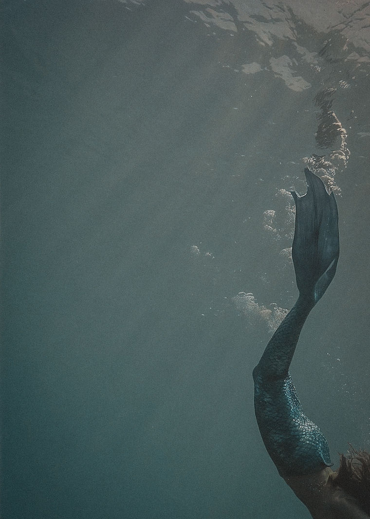 underwater_mermaid_tail_ocean_scene.jpg