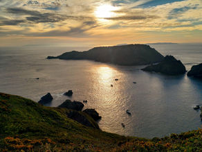 sunset over Brecqhou from Pilcher Monument, Sark