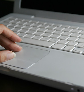 Hand Using Laptop