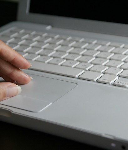 Hand Using Laptop
