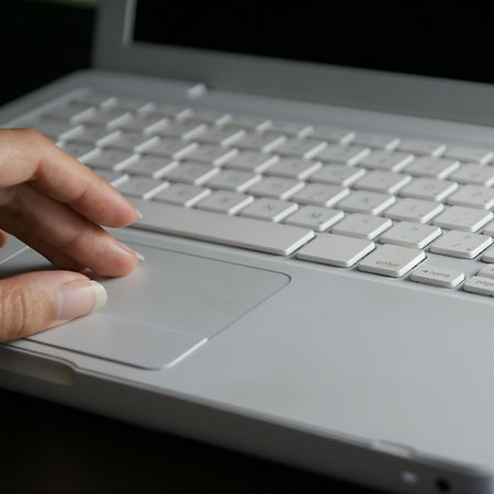 Hand Using Laptop